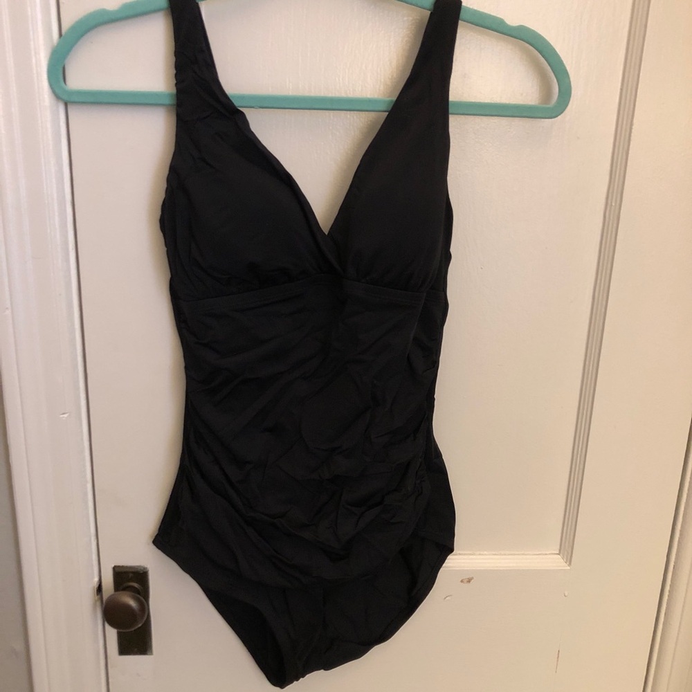 Jantzen black one piece. New with tags. Size 8.